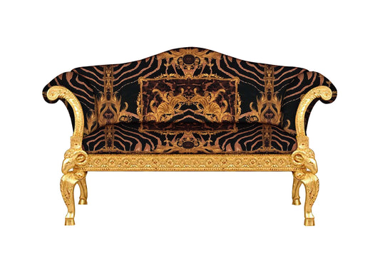 An image depicting a luxurious Versace Zahara leopard fabric love seat sofa with a solid wood frame and gold leaf finish, featuring intricate ram's head carvings.